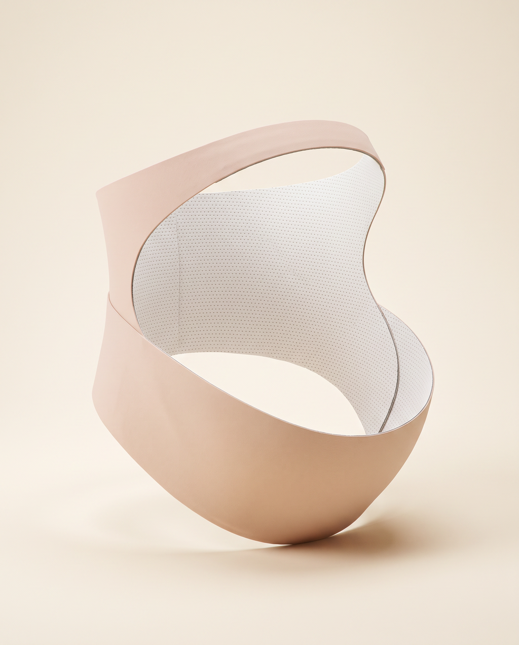 Contour Bump Support in beige showing its sculpted one-piece shape and perforated inner lining
