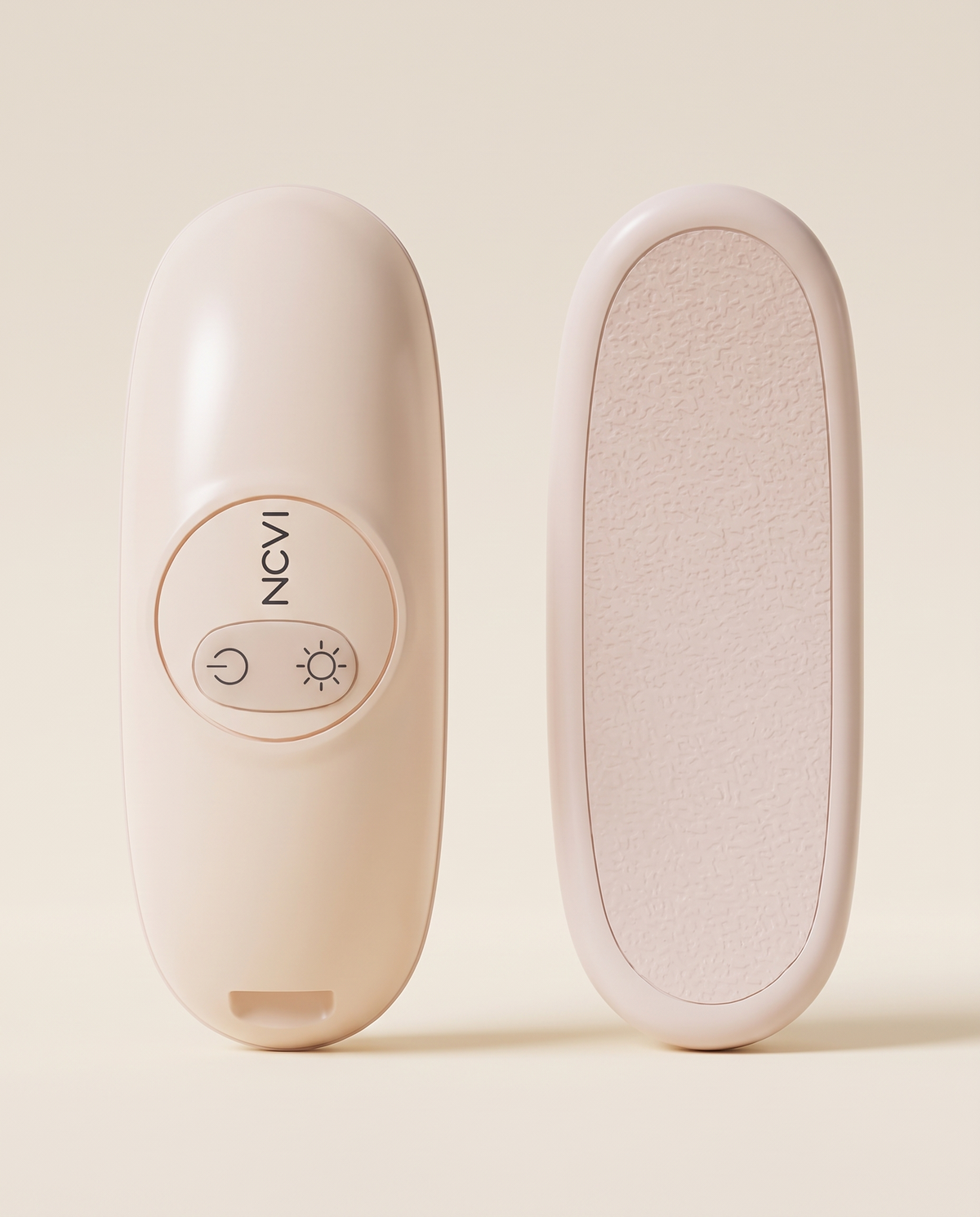 Front and back of the warming lactation massager showing the control panel and silicone pad